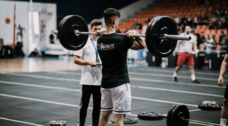 Athlete training on a sports field to improve athletic success, sports performance, and overall fitness through disciplined practice