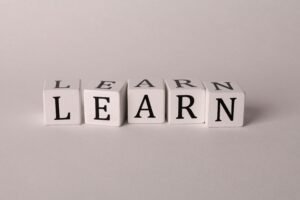 Beginner learning German, French, English, Italian, and Spanish using language books and mobile apps.