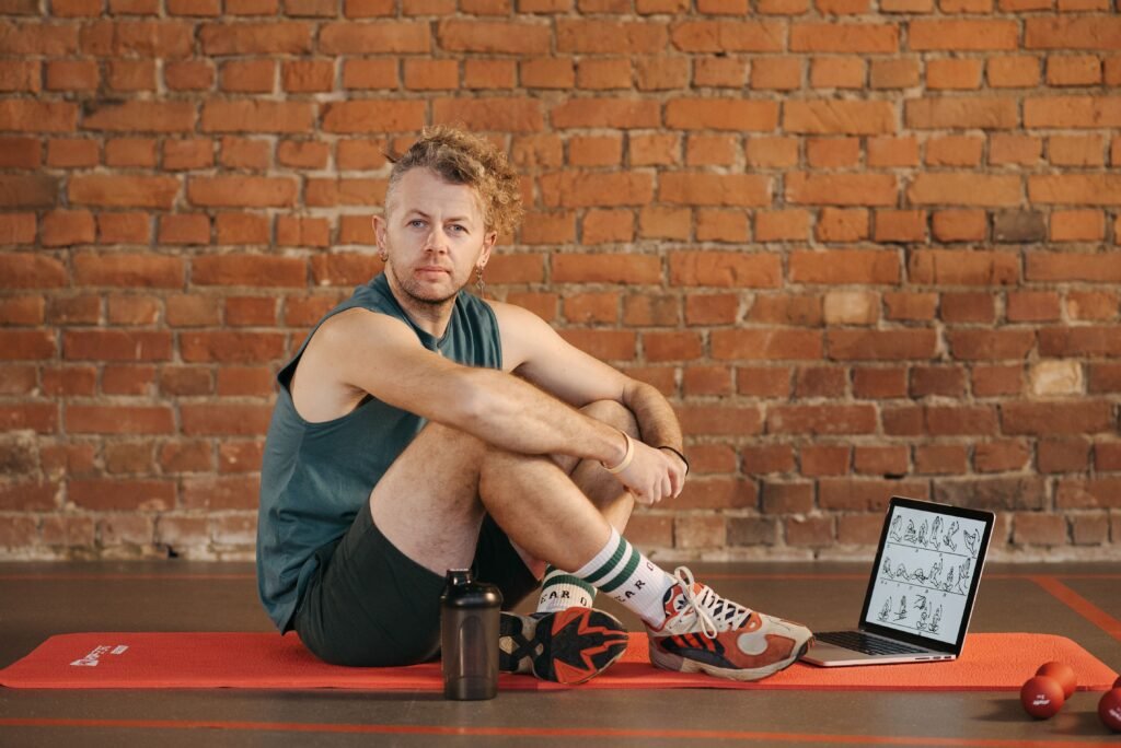 Athlete performing a dynamic kettlebell swing in a home gym setup. 