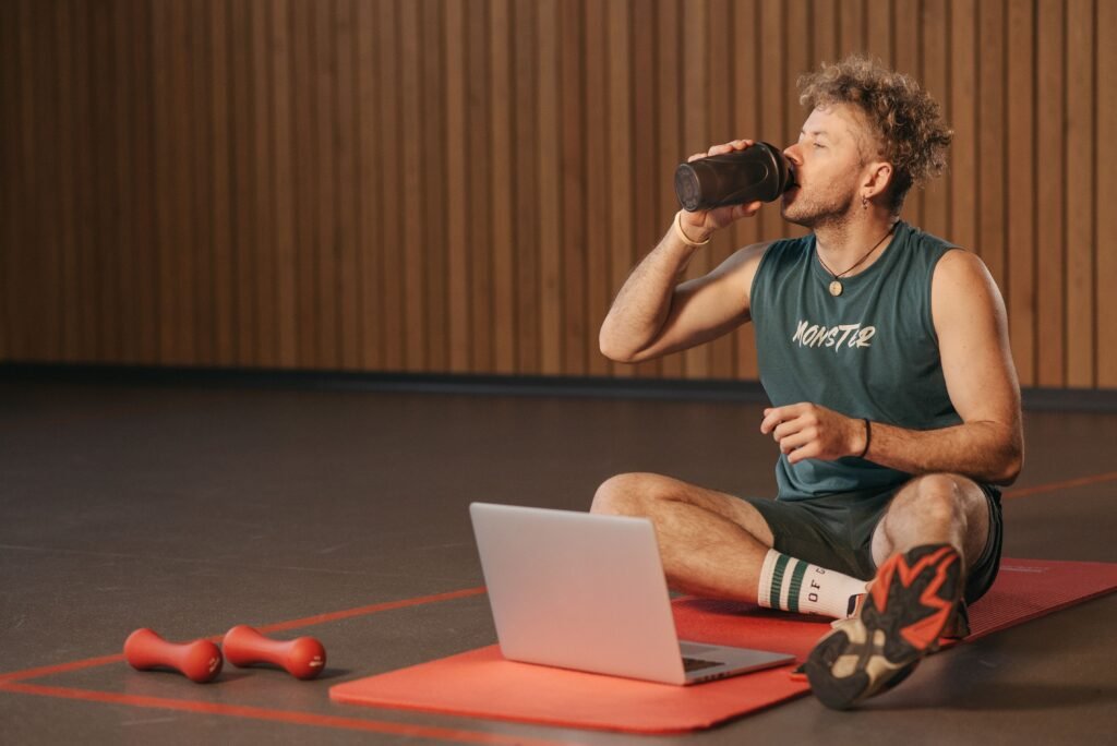 Person checking heart rate variability and recovery metrics on a smartwatch during a workout.