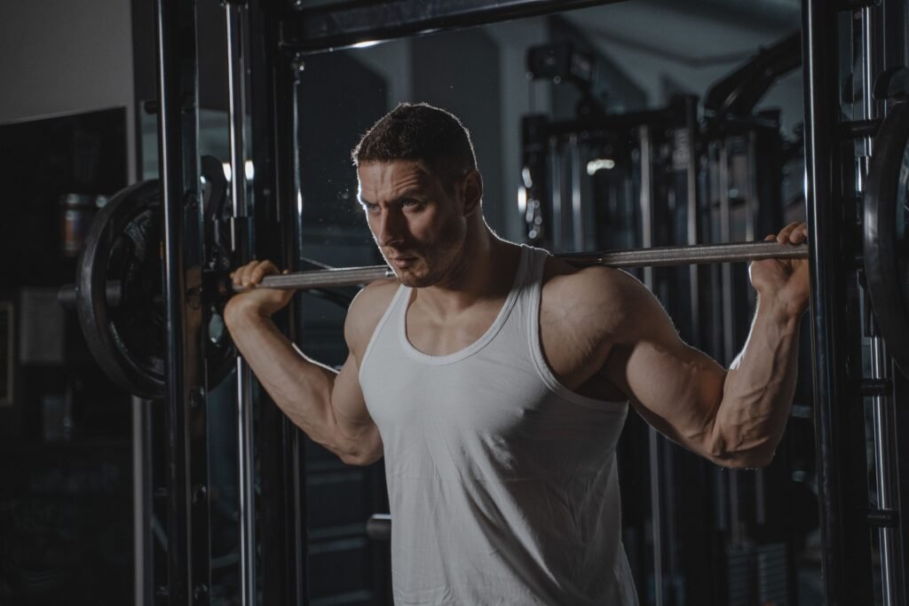 An athlete checking heart rate variability metrics on a wearable monitor to assess readiness score.