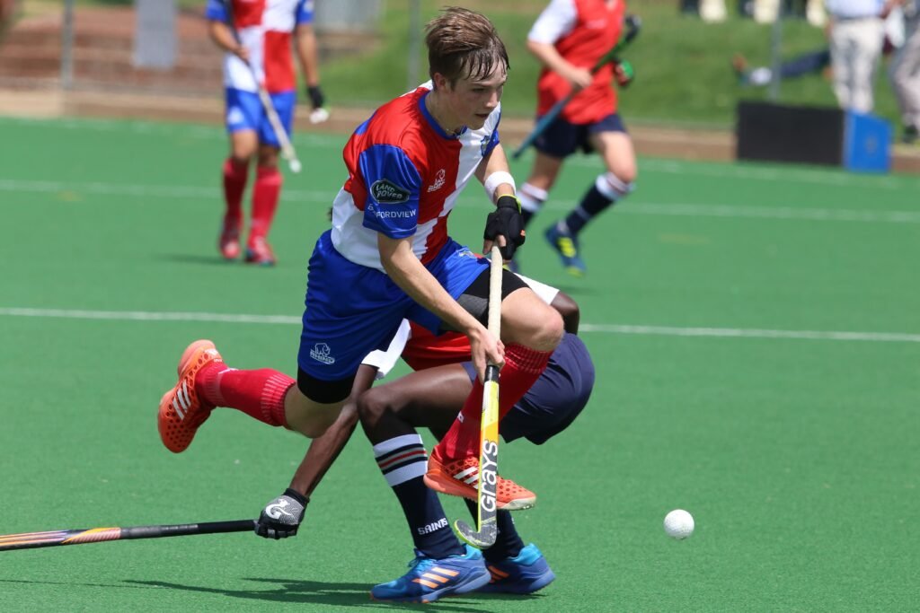 Malaysian field hockey team playing a competitive match 