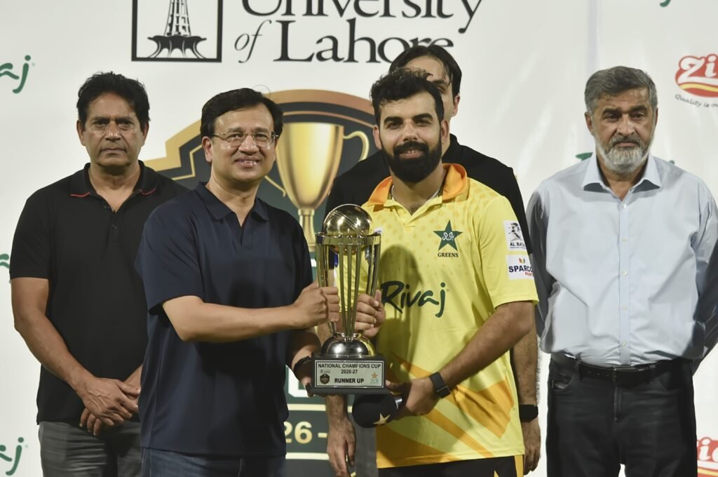 alt="Shadab Khan hitting a boundary during his middle-order century in the National Champions Cup final"