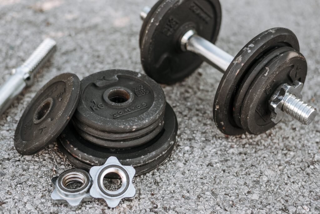 Fitness athlete performing high-intensity interval training on an Airdyne bike to maximize calorie burn.
