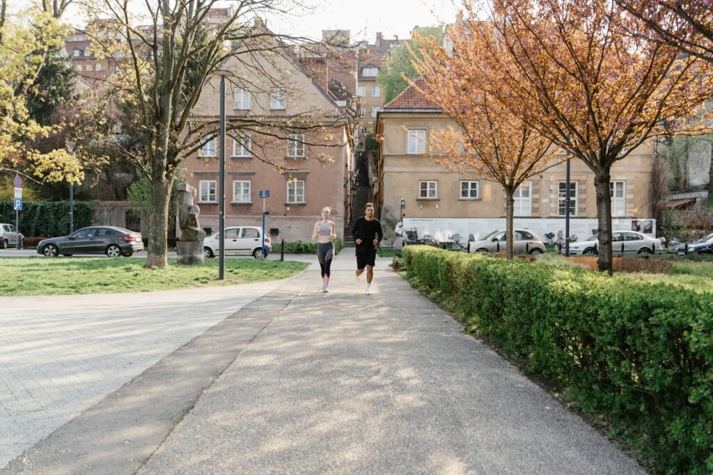 Commuters utility cycling along dedicated bike lanes in Copenhagen during daily transit.