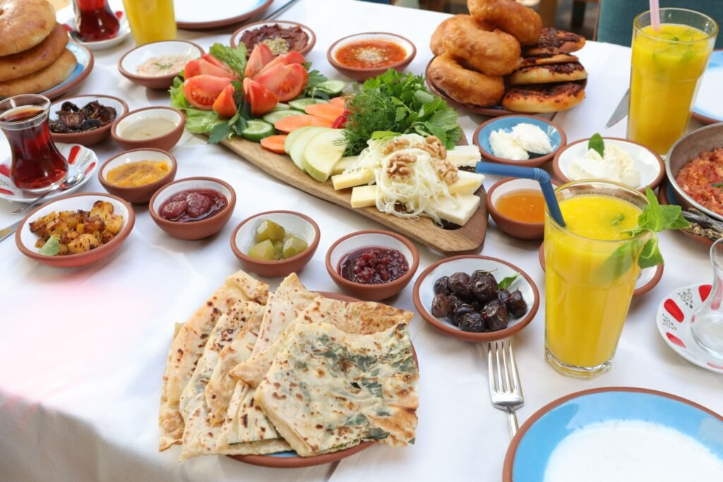 Traditional Turkish breakfast spread featuring eggs, beyaz peynir cheese, olives, and sliced cucumbers for metabolic health.