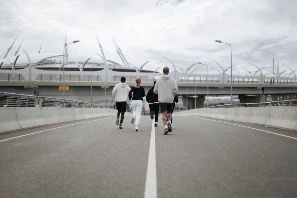 Local community members playing recreational sports inside a European Sportverein facility.