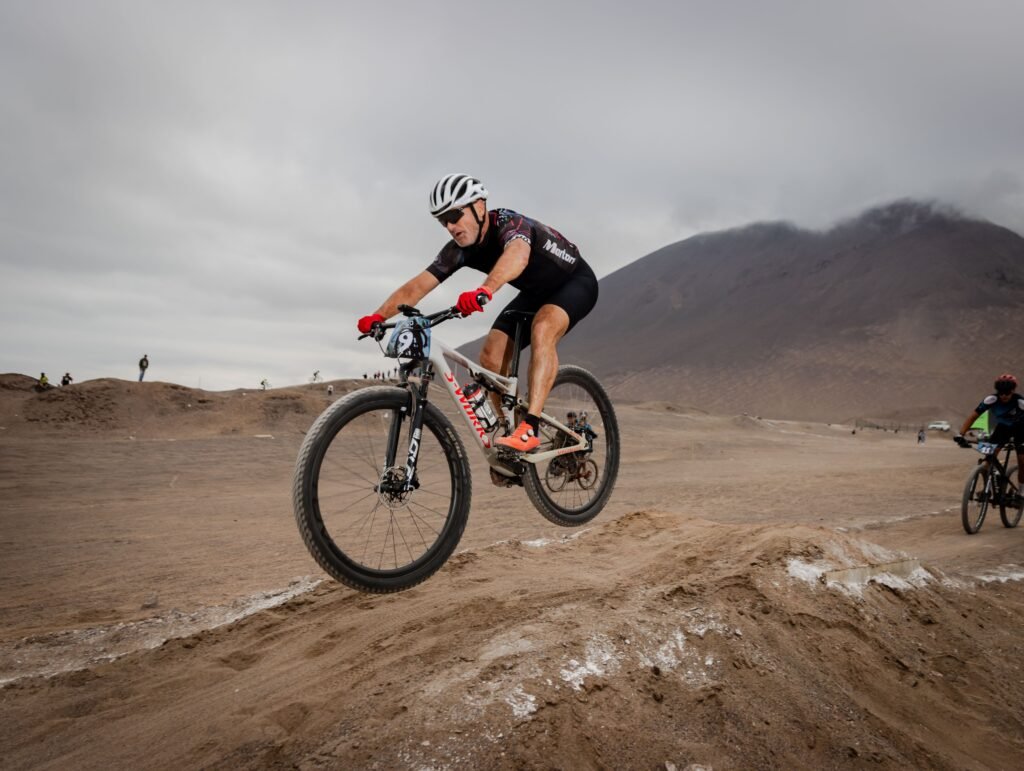 UCI Mountain Bike World Championships Head to Val di Sole Cyclists sprinting across the finish line in the short track event.