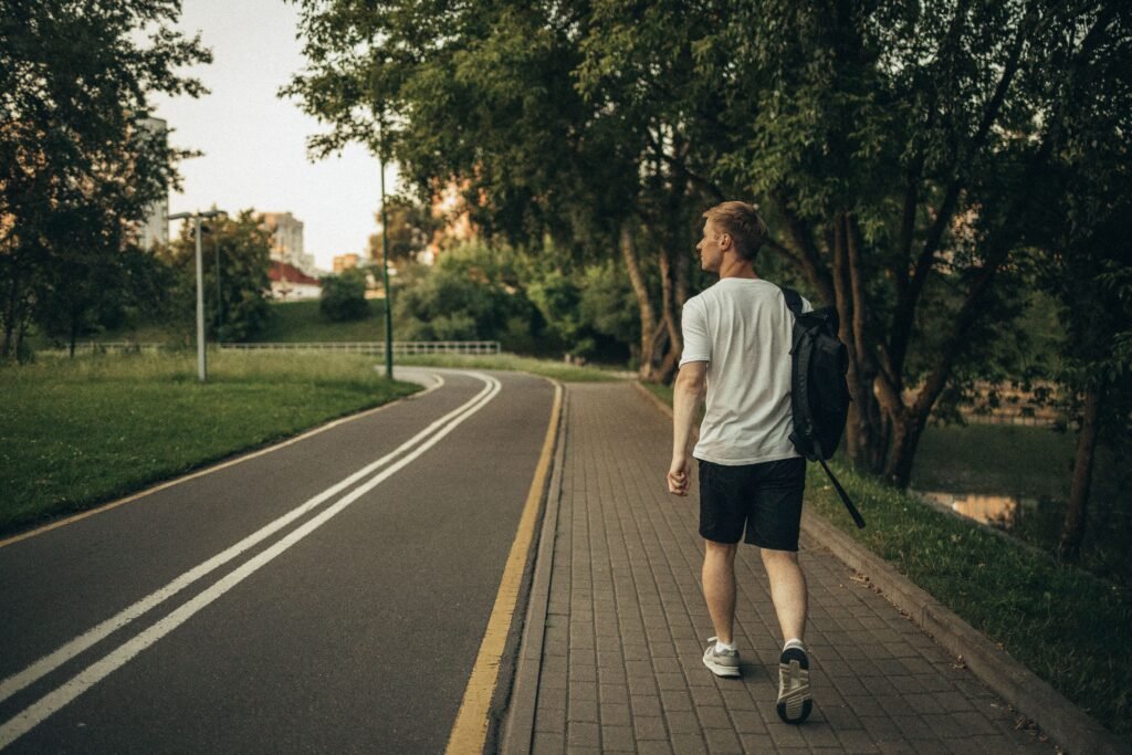Person walking outdoors for fitness