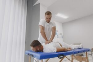 Person performing a gentle lower back stretch on an exercise mat