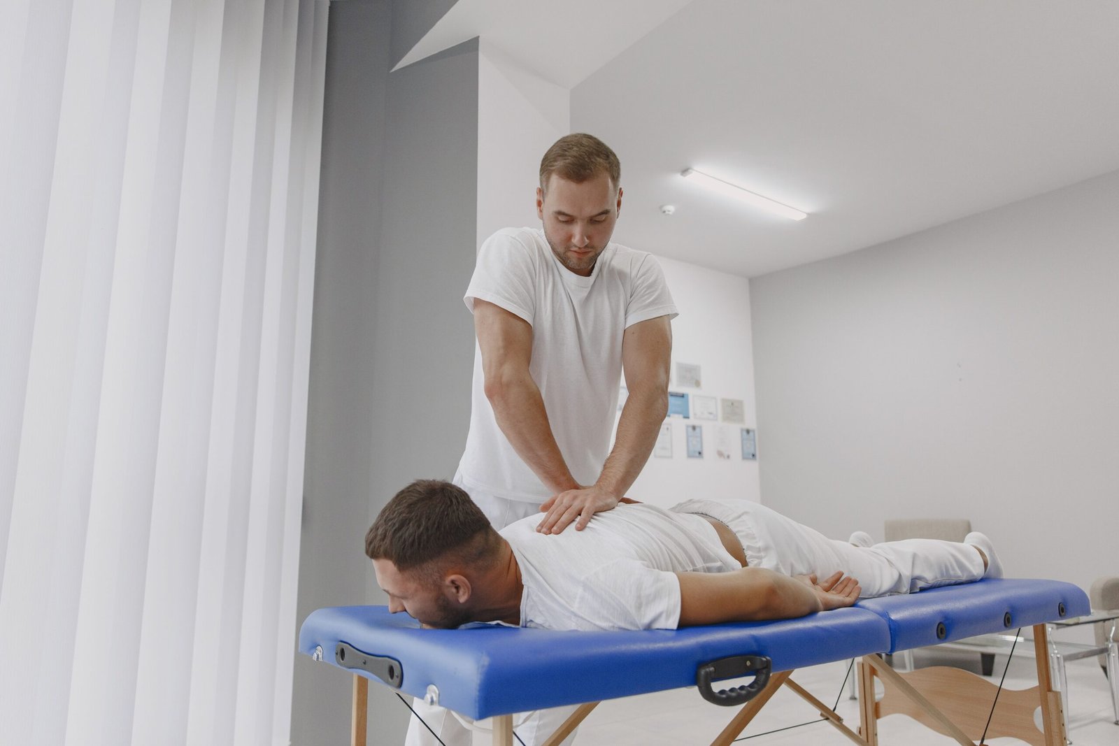 Person performing a gentle lower back stretch on an exercise mat